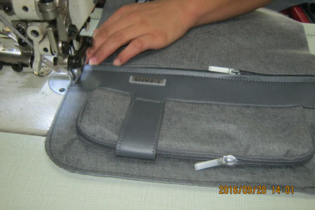 專業(yè)背包生產(chǎn)廠家 廣東包工廠直供TCL鐵粉節(jié)禮品背包